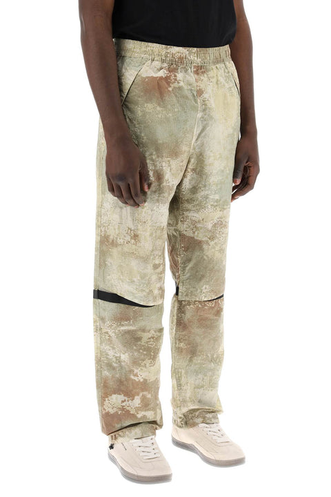Stone Island Stone Island econyl printed dissolving grid camo pants